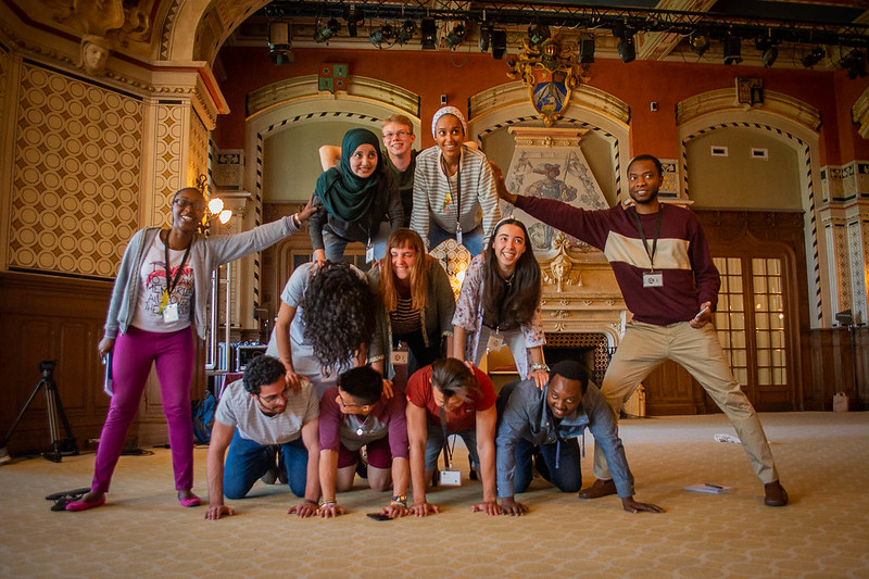 young people forming a human pyramid